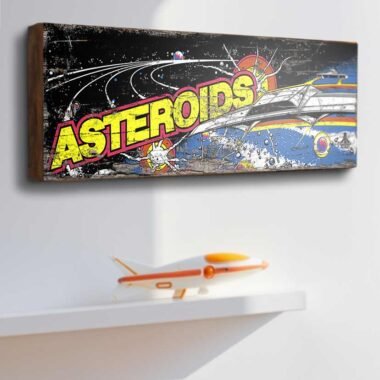 Capture the thrill of the arcade with our "Asteroids" Retro Game Sign. This nostalgic piece features the iconic artwork from the classic arcade game Asteroids