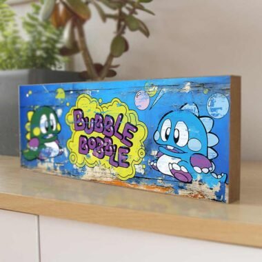 Celebrate the timeless charm of Bubble Bobble with our Retro Game Sign. Perfect for adding a touch of arcade nostalgia to any space. Order now and bring home the magic of Bub and Bob!