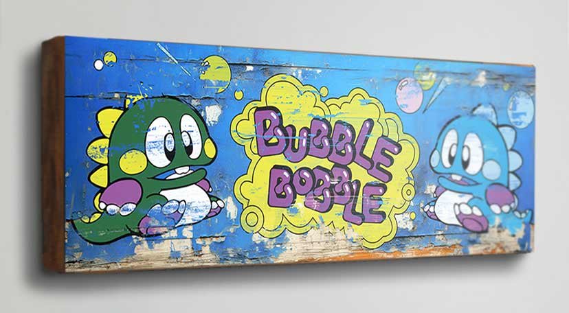 Celebrate the timeless charm of Bubble Bobble with our Retro Game Sign. Perfect for adding a touch of arcade nostalgia to any space. Order now and bring home the magic of Bub and Bob!