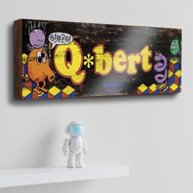 Relive the fun and frustration of hopping through Q*bert’s world with this beautifully crafted Retro Game Sign