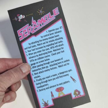 Scramble arcade game instruction card. Retro game signs