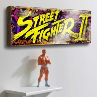 Faithfully reproduces the iconic "Street Fighter II" logo with its dynamic yellow lettering against a colorful, distressed background that captures the essence of the original arcade artwork.